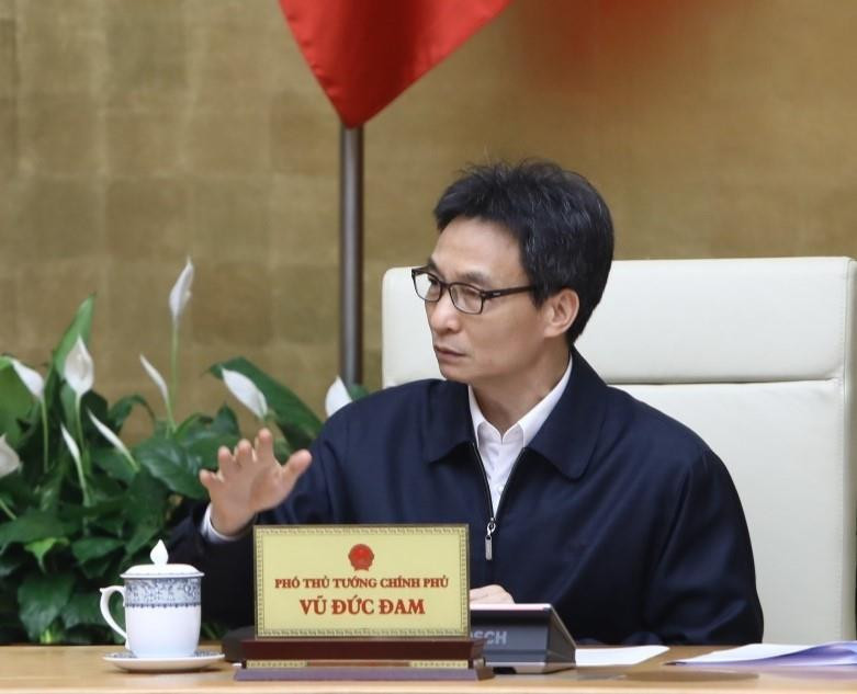 Phó Thủ tướng Vũ Đức Đam chủ trì cuộc họp. (Ảnh: Văn Điệp/TTXVN)