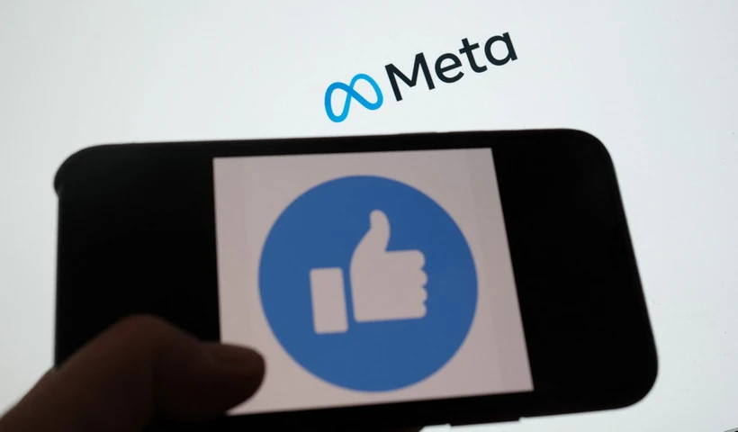 Biểu tượng của Meta trên màn hình máy tính. (Ảnh: AFP/TTXVN)