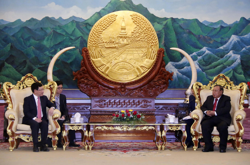 Tổng Bí thư, Chủ tịch nước Lào Bounnhang Vorachith tiếp Phó Thủ tướng, Bộ trưởng Ngoại giao Phạm Bình Minh. (Ảnh: Phạm Kiên/TTXVN)