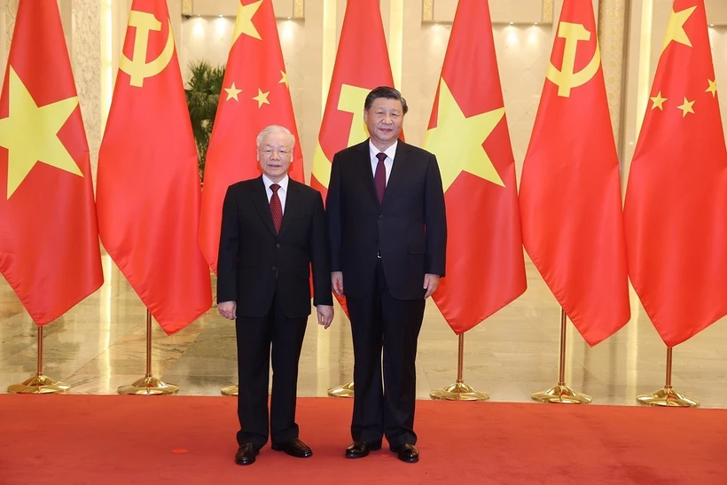 Tổng Bí thư Nguyễn Phú Trọng và Tổng Bí thư, Chủ tịch Trung Quốc Tập Cận Bình chụp ảnh chung. (Ảnh: Trí Dũng/TTXVN)