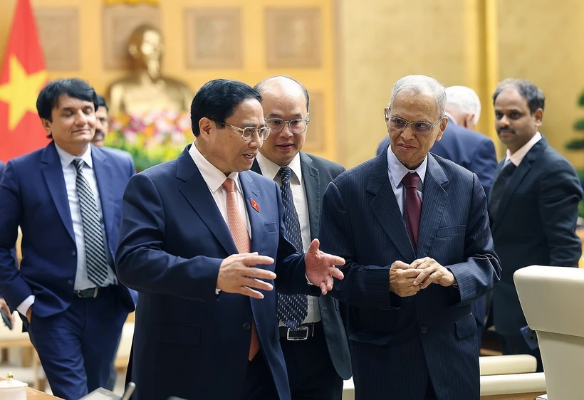 Thủ tướng Phạm Minh Chính tiếp ông Narayana Murthy, đồng sáng lập hãng phần mềm Infosys của Ấn Độ (Hà Nội, 20/5/2024). (Ảnh: Dương Giang/TTXVN)
