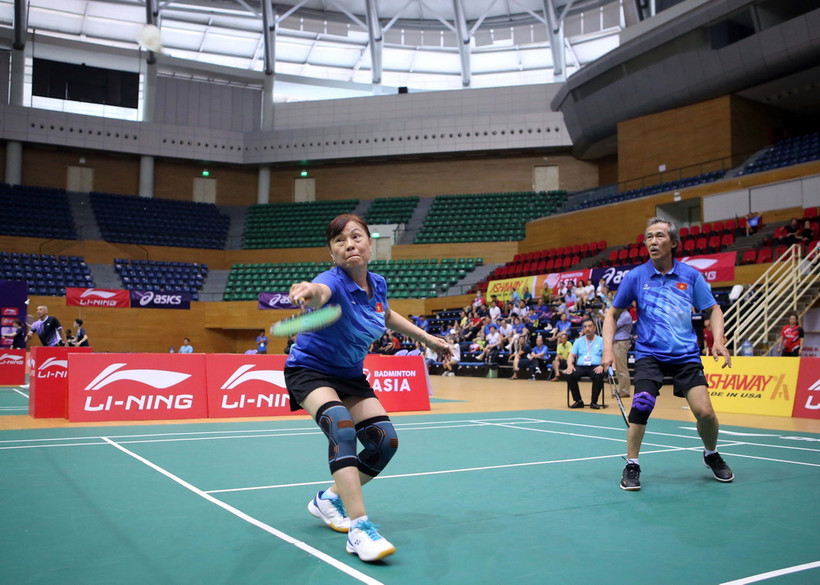 Trận đấu đôi nam nữ tại vòng loại. (Ảnh: Trần Lê Lâm/TTXVN)