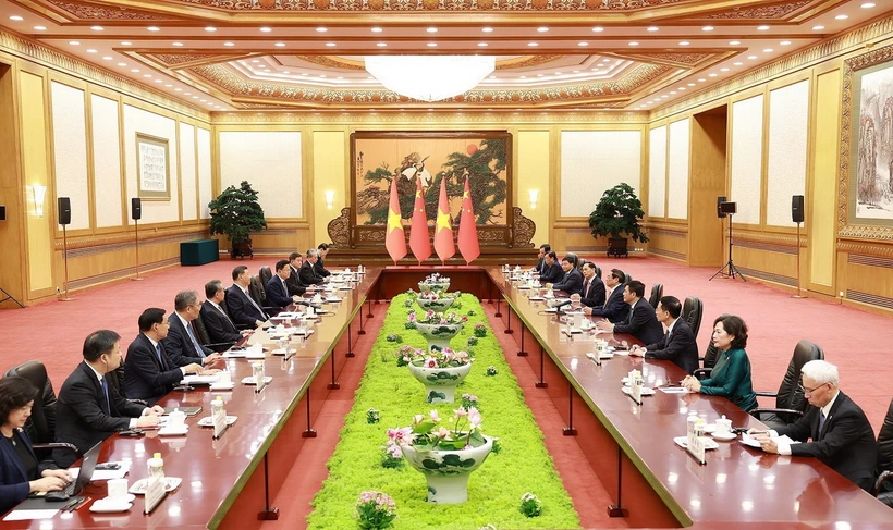 Thủ tướng Phạm Minh Chính hội kiến Tổng Bí thư, Chủ tịch Trung Quốc Tập Cận Bình. (Ảnh: Dương Giang/TTXVN)