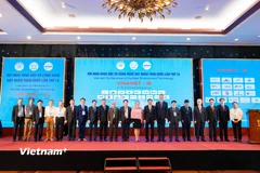 Đại diện lãnh đạo các cơ quan, tổ chức trong nước và quốc tế tham dự Hội nghị Khoa học và Công nghệ hạt nhân toàn quốc lần thứ 16. (Ảnh: Thanh Phong/Vietnam+)