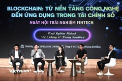 Tọa đảm giữa các chuyên gia về các vấn đề pháp lý liên quan đến tài sản số. (Ảnh: Thanh Phong/Vietnam+)