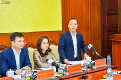 Ông Lê Hoàng Chính Quang, Cục trưởng Cục Công nghệ thông tin thông tin Ngân hàng Nhà nước chia sẻ tại họp báo. (Ảnh: Vietnam+)