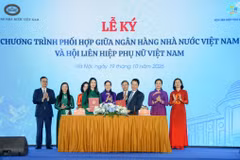 Ngân hàng Nhà nước Việt Nam và Hội Liên hiệp Phụ nữ Việt Nam thực hiện nghi thức ký kết Chương trình phối hợp công tác giai đoạn 2026-2030. (Ảnh: Vietnam+)