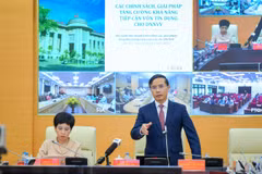 Thống đốc Ngân hàng Nhà nước Phạm Đức Ấn phát biểu kết luận tại Hội nghị. (Ảnh: Vietnam+)