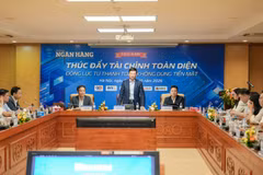 Phó Thống đốc Ngân hàng Nhà nước Phạm Thanh Hà chỉ đạo tại tọa đàm “Thúc đẩy tài chính toàn diện - Động lực từ thanh toán không dùng tiền mặt”. (Ảnh: Vietnam+)