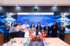 Lễ ký kết thỏa thuận hợp tác giữa Công ty Thương mại Hòa Phát và Thai Livestock Meat Exporter- Importer Association (TLEX). (Ảnh: Vietnam+)