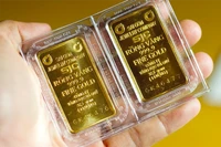 Giá vàng SJC của Công ty Vàng bạc đá quý Sài Gòn, Công ty Doji, Công ty Phú Quý niêm yết từ 160,8-163,8 triệu đồng/lượng. (Ảnh: Vietnam+)