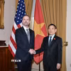Phó Thủ tướng Hồ Đức Phớc gặp Đại diện Thương mại Mỹ Jamieson Greer. (Ảnh: TTXVN phát)