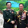 Đại tướng Phan Văn Giang hội kiến Thượng tướng Khamliang Outhakaysone. (Nguồn: Báo Quân đội Nhân dân)