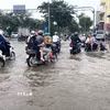 Triều cường gây ngập tại Thành phố Hồ Chí Minh. (Ảnh minh họa: Hương Giang/TTXVN)