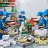Lao động nữ tại một hợp tác xã. (Ảnh: Tường Vi/TTXVN)