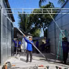 Thành viên Tổ cất nhà tình thương số 2 Định Yên xây dựng nhà cho gia đình có hoàn cảnh khó khăn ở xã Đốc Binh Kiều, tỉnh Đồng Tháp. (Ảnh: Nhựt An/TTXVN)