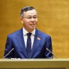 Bộ trưởng Bộ Tài chính Ngô Văn Tuấn, thừa ủy quyền của Thủ tướng Chính phủ trình bày tờ trình về 5 dự án: Luật Ngân sách nhà nước (hợp nhất); Luật Đấu thầu (sửa đổi); Luật sửa đổi, bổ sung một số điều của Luật Đầu tư; Luật sửa đổi, bổ sung một số điều của Luật Thuế thu nhập doanh nghiệp, Luật Thuế sử dụng đất phi nông nghiệp, Luật Thuế thu nhập cá nhân; Luật Trưng mua, trưng dụng tài sản (sửa đổi). (Ảnh: Doãn Tấn/TTXVN)