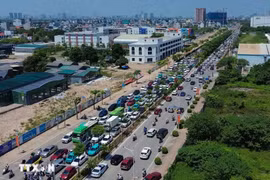 Giao thông tại đường Cổ Linh (Hà Nội) ngày 2/9. (Ảnh: Phan Phương/TTXVN)