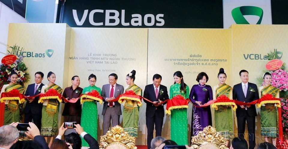 Ngân hàng TMCP Ngoại thương Việt Nam (Vietcombank) khai trương hoạt động Ngân hàng TNHH MTV Ngoại thương Việt Nam tại Lào (Vietcombank Lào), 19/8/2018. (Ảnh: Phạm Kiên/TTXVN)