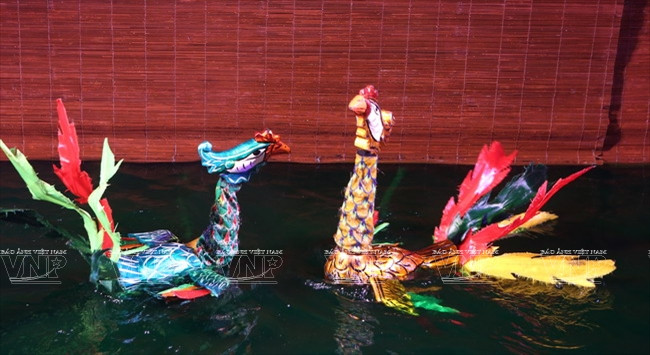 Tiết mục rối nước “Đánh cáo bắt vịt” trong chương trình "Long Thành diễn xướng." (Nguồn: Báo ảnh Việt Nam)