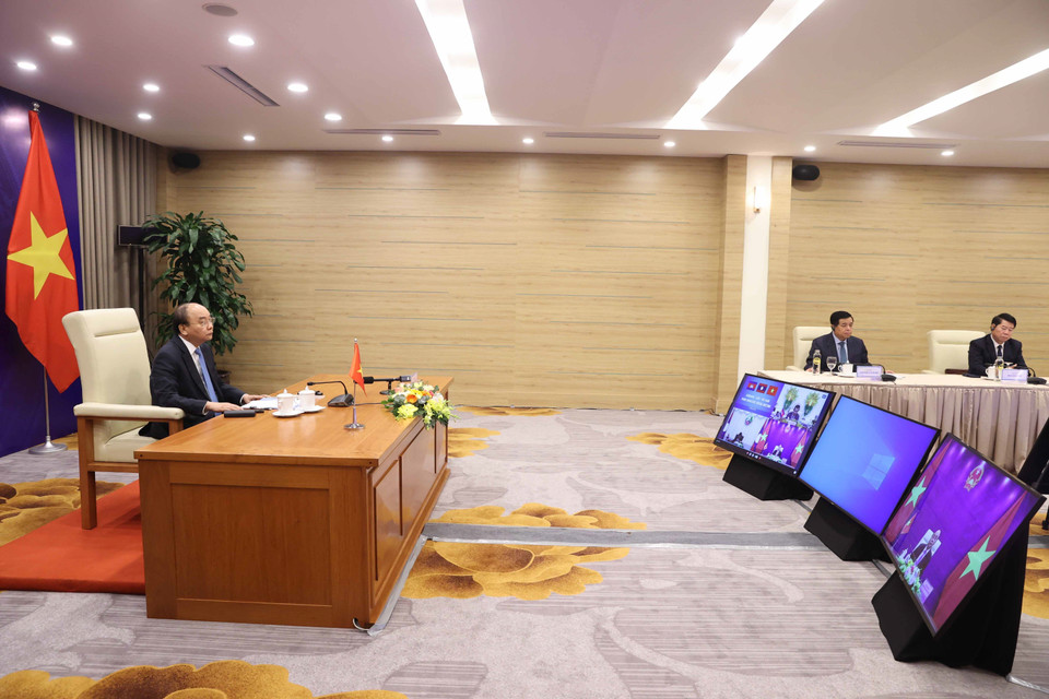 Thủ tướng Nguyễn Xuân Phúc phát biểu tại điểm cầu Hà Nội. (Ảnh: Thống Nhất/TTXVN)