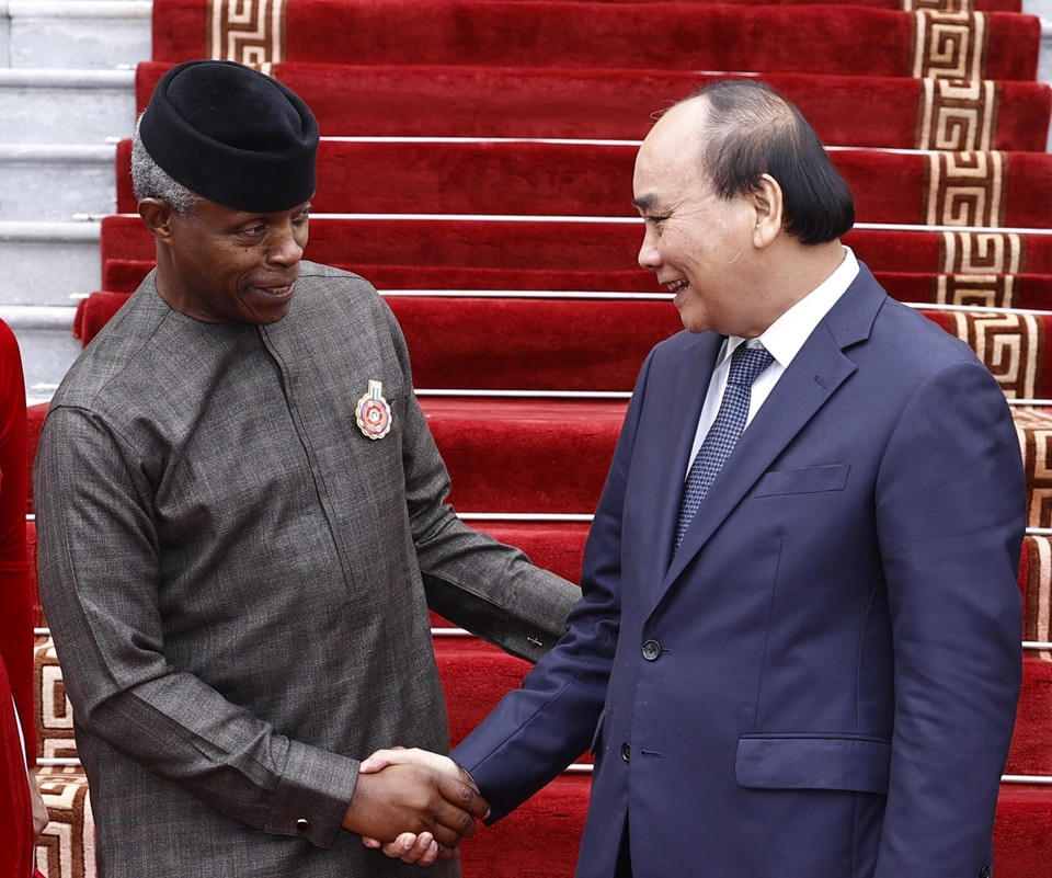 Chủ tịch nước Nguyễn Xuân Phúc tiếp Phó Tổng thống Cộng hòa Liên bang Nigeria Yemi Osinbajo. (Ảnh: Thống Nhất/TTXVN)