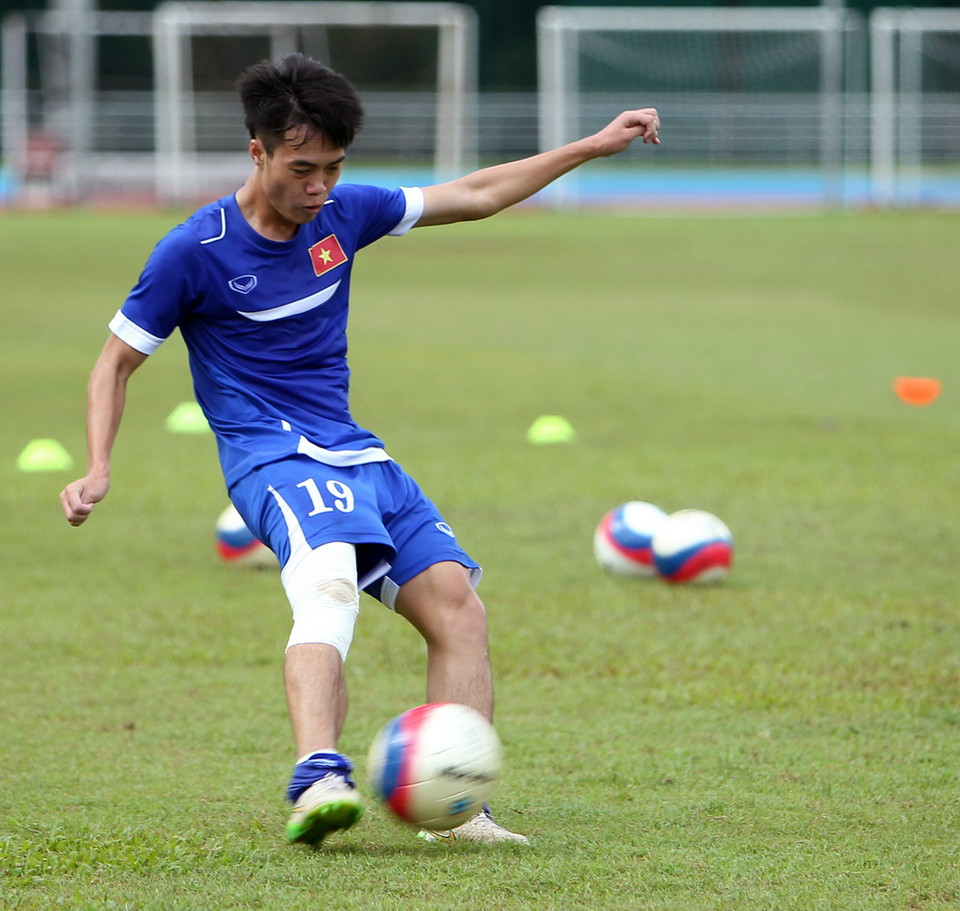 Tiền đạo Văn Toàn vẫn phải tập riêng do chưa hồi phục chấn thương. (Ảnh: Quốc Khánh/TTXVN)