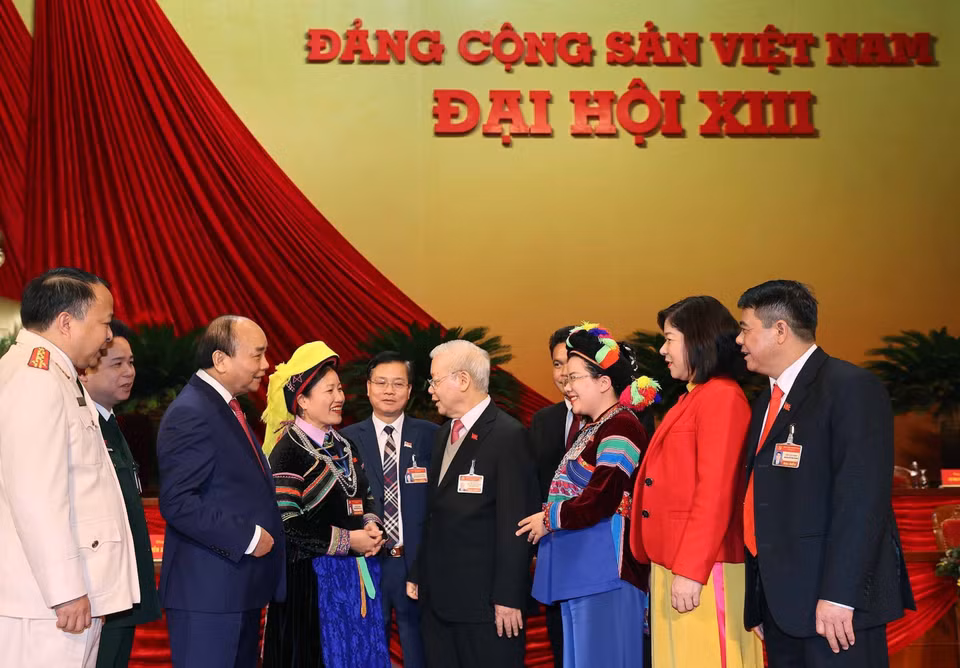 Tổng Bí thư, Chủ tịch nước Nguyễn Phú Trọng và Ủy viên Bộ Chính trị, Thủ tướng Chính phủ Nguyễn Xuân Phúc gặp gỡ các đại biểu dự Đại hội, sáng 29/1. (Nguồn: TTXVN)