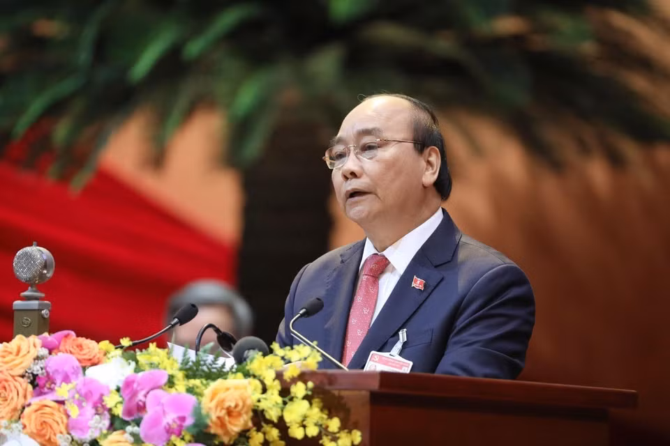 Đồng chí Nguyễn Xuân Phúc, Ủy viên Bộ Chính trị, Thủ tướng Chính phủ thay mặt Đoàn Chủ tịch đọc Diễn văn khai mạc Đại hội, sáng 26/1/2021. (Nguồn: TTXVN)