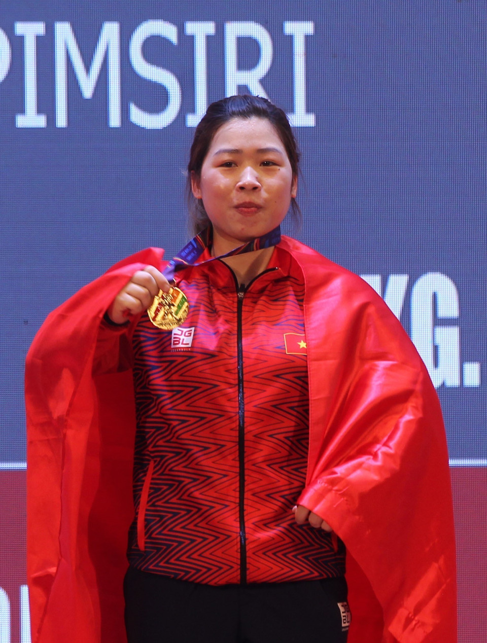VĐV Hoàng Thị xuất sắc đoạt HCV hạng cân 59 kg nữ với tổng cử là 204kg. (Ảnh: Quốc Khánh/TTXVN)