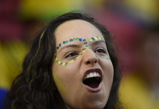 Sự cổ vũ hết mình của các cổ động viên Brazil không được đền đáp. (Nguồn: AFP)