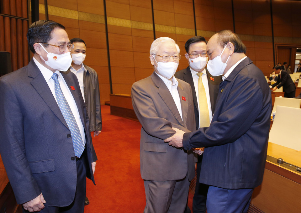 Tổng Bí thư Nguyễn Phú Trọng, Chủ tịch nước Nguyễn Xuân Phúc, Thủ tướng Phạm Minh Chính, Chủ tịch Quốc hội Vương Đình Huệ đến dự phiên họp. (Ảnh: Doãn Tấn/TTXVN)