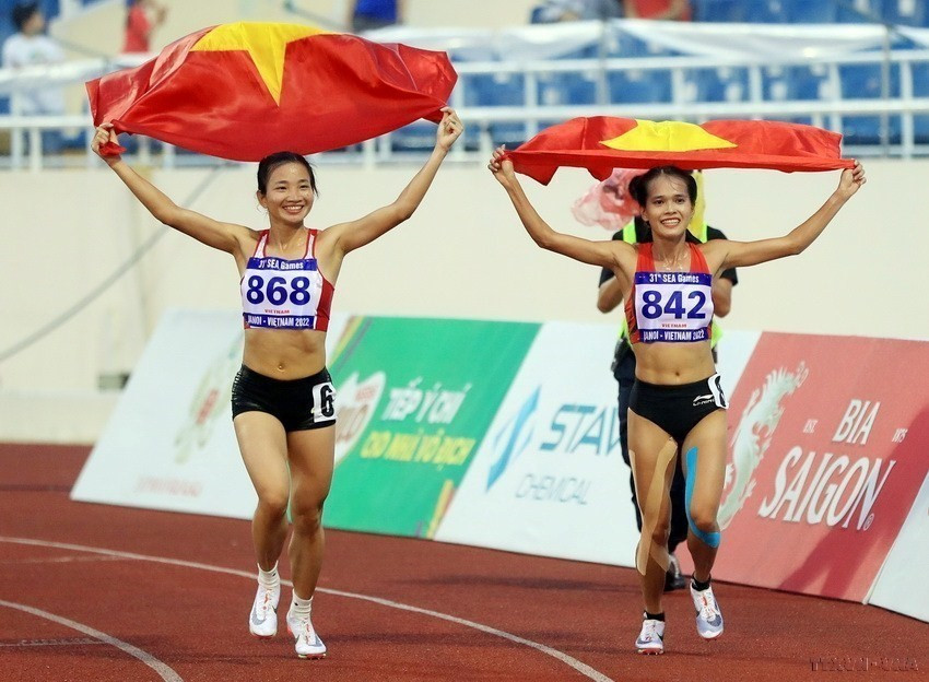 Những “Bông hồng Vàng” của điền kinh Việt Nam đã góp phần quan trọng đưa đoàn thể thao nước chủ nhà vươn lên dẫn đầu bảng tổng sắp tại Sea Games 31. (Ảnh: Huy Hùng/TTXVN)