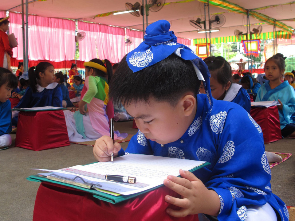 Thiếu nhi Bến Tre tham dự hội thi 'Văn hay-Sử rõ' nhân ngày Quốc tế thiếu nhi 1/6 và Tháng hành động vì trẻ em năm 2014. (Ảnh: Trần Thị Thu Hiền/TTXVN)