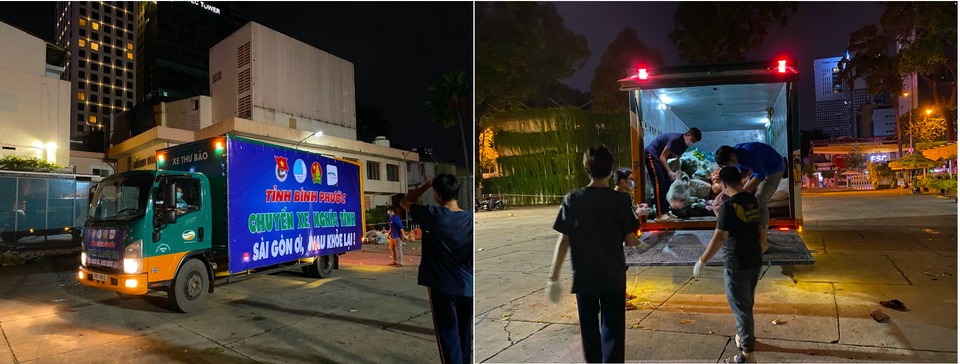 Ngay khi Chuyến xe nghĩa tình vào bến tại Nhà Văn hóa thanh niên (quận 1), các tình nguyện viên đã chờ sẵn để vận chuyển hàng hóa xuống. (Ảnh: Thắng Trân/Vietnam+)