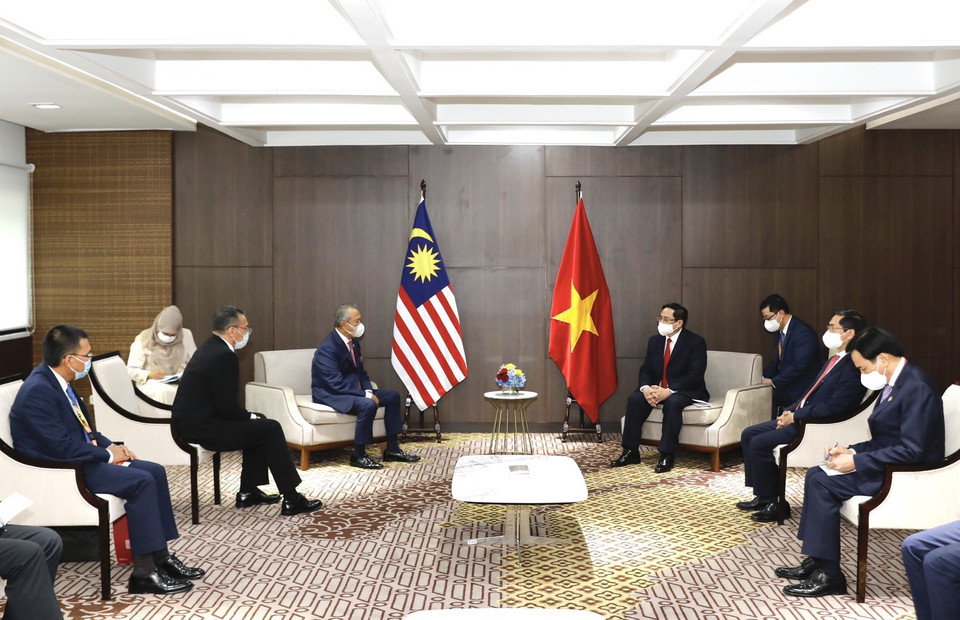 Thủ tướng Phạm Minh Chính hội kiến Thủ tướng Malaysia Muhyiddin Yassin. (Ảnh: Dương Giang/TTXVN)