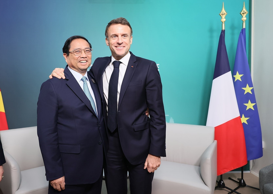 Thủ tướng Phạm Minh Chính gặp Tổng thống Pháp Emmanuel Macron. (Ảnh: Dương Giang/TTXVN)