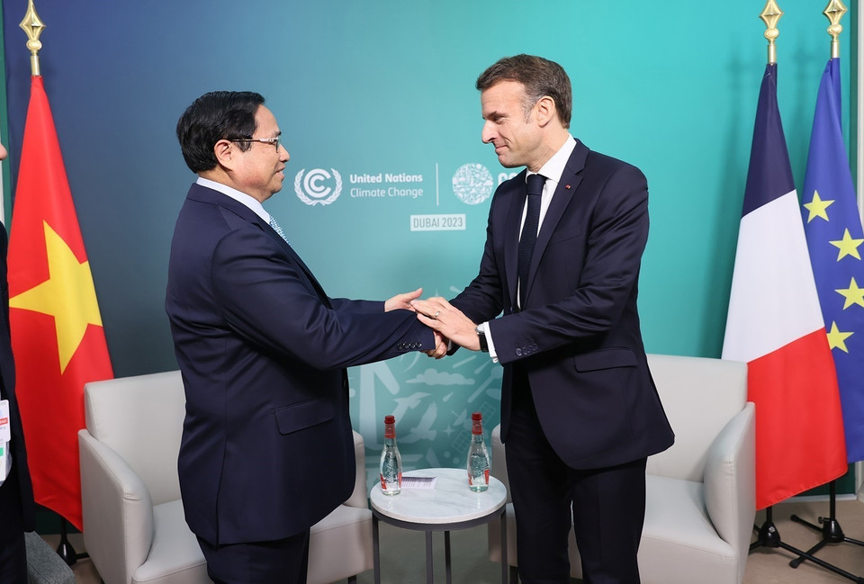 Thủ tướng Phạm Minh Chính gặp Tổng thống Pháp Emmanuel Macron. (Ảnh: Dương Giang/TTXVN)