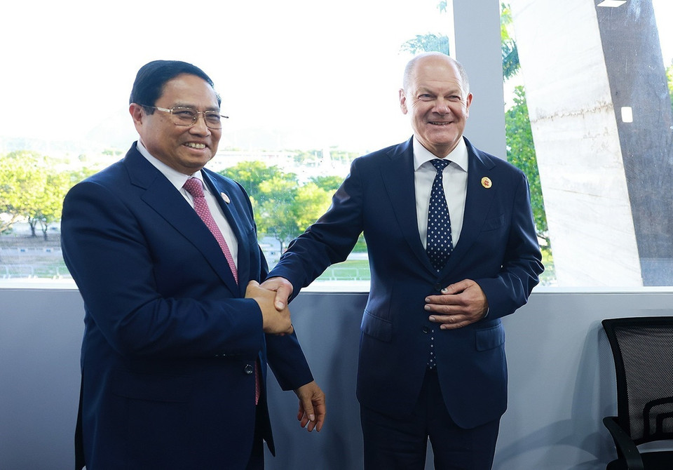 Thủ tướng Phạm Minh Chính gặp Thủ tướng Đức Olaf Scholz. (Ảnh: Dương Giang/TTXVN)