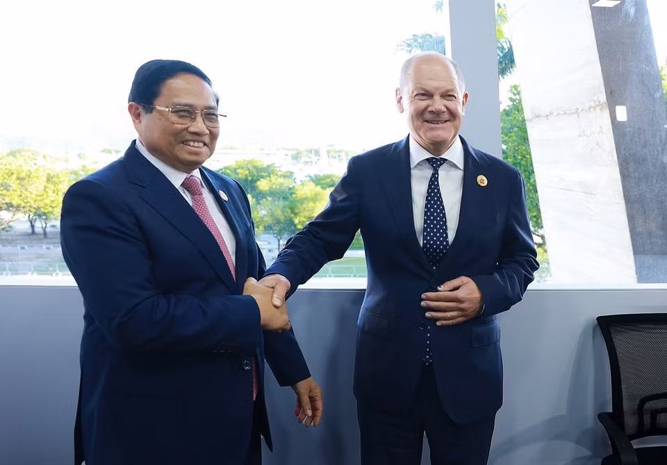 Thủ tướng Phạm Minh Chính gặp Thủ tướng Đức Olaf Scholz. (Ảnh: Dương Giang/TTXVN)