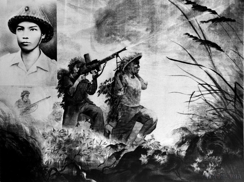 Anh hùng Bế Văn Đàn lấy thân mình làm giá súng trong trận chiến đấu ở Mường Pồn. Anh hy sinh khi hai tay còn ghì chặt chân súng trên vai mình. (Ảnh: Tư liệu TTXVN)