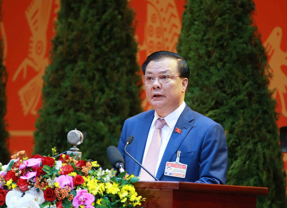 Đồng chí Đinh Tiến Dũng, Ủy viên Trung ương Đảng, Bộ trưởng Bộ Tài chính tham luận tại Đại hội. (Nguồn: TTXVN)