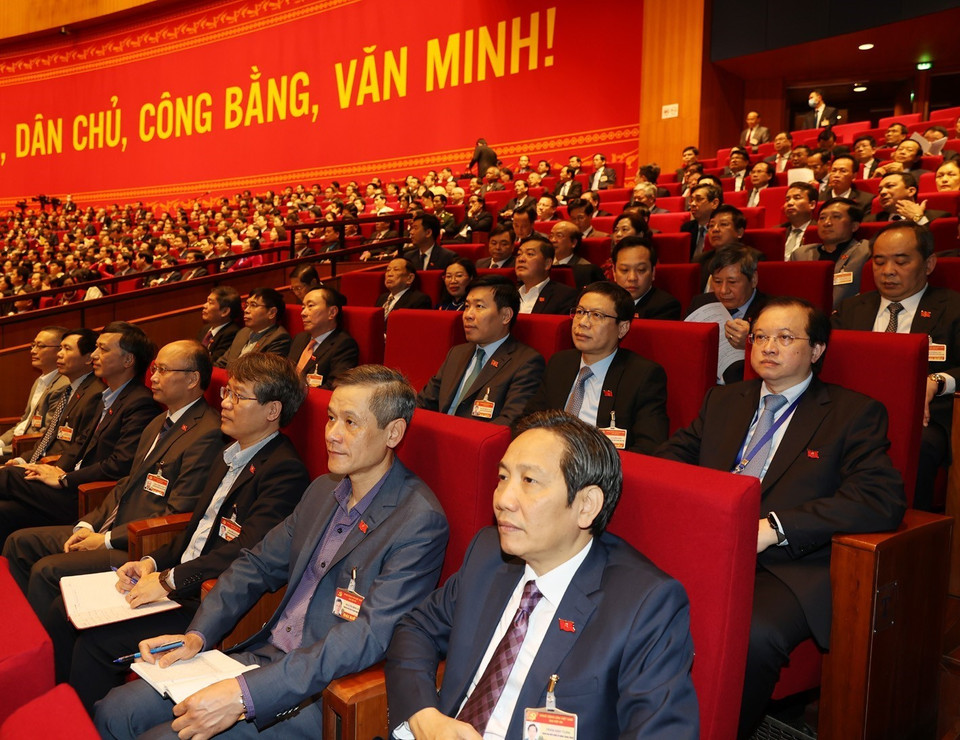 Đại biểu dự phiên thảo luận các văn kiện đại hội tại hội trường, sáng 28/1 (Nguồn: TTXVN)