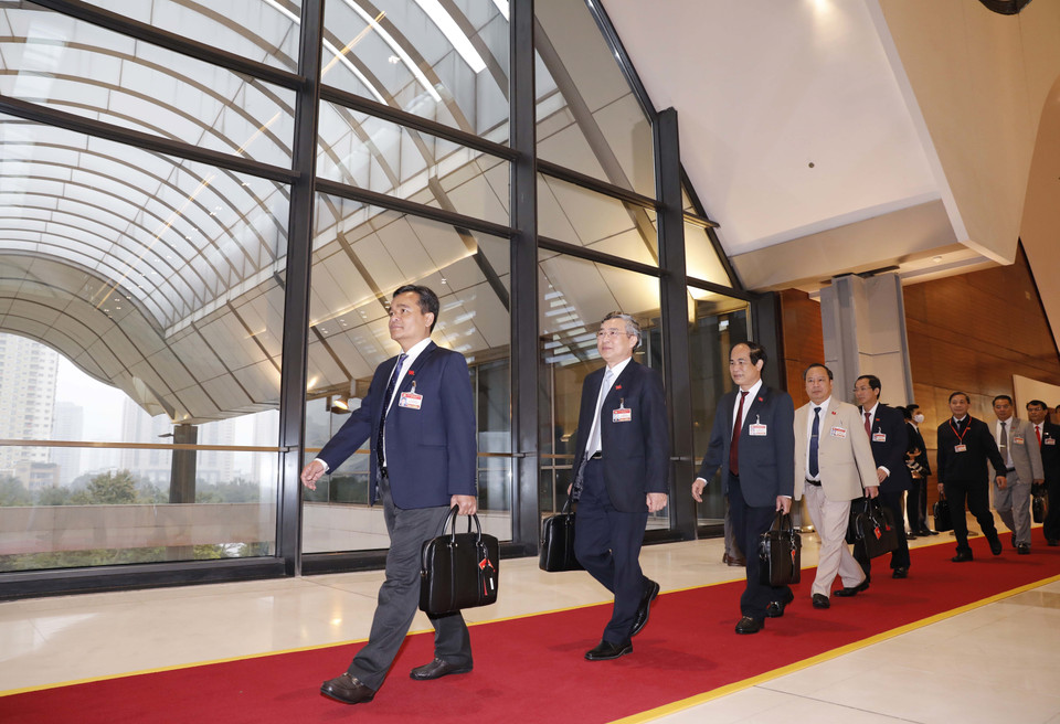 Đoàn đại biểu Đảng bộ tỉnh Gia Lai đến dự Đại hội, sáng 28/1. (Nguồn: TTXVN)