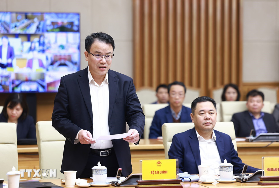 Thứ trưởng Bộ Tài chính Trần Quốc Phương báo cáo công tác triển khai các cam kết, thỏa thuận trong các hoạt thuế và hải quan. (Ảnh: Dương Giang/TTXVN)