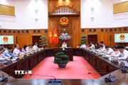 Thủ tướng Lê Minh Hưng chủ trì cuộc họp về phát triển Trung tâm tài chính quốc tế tại Việt Nam. (Ảnh: Dương Giang/TTXVN)