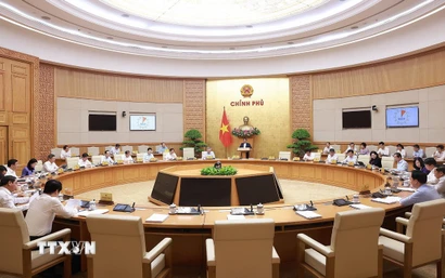 Phiên họp Chính phủ chuyên đề về xây dựng pháp luật tháng 7 năm 2025. (Ảnh: Dương Giang/TTXVN)
