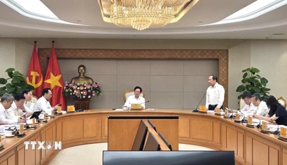 Phó Thủ tướng Hồ Quốc Dũng chủ trì họp với các bộ ngành về công nghệ chiến lược. (Ảnh: Xuân Tùng/TTXVN)