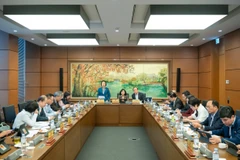 Các đại biểu Quốc hội thảo luận tại tổ Hà Nội. (Ảnh: PV/Vietnam+)