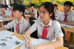Giờ học của học sinh Trường Trung học cơ sở Pom Lót, tỉnh Điện Biên. (Ảnh: Phạm Mai/Vietnam+)